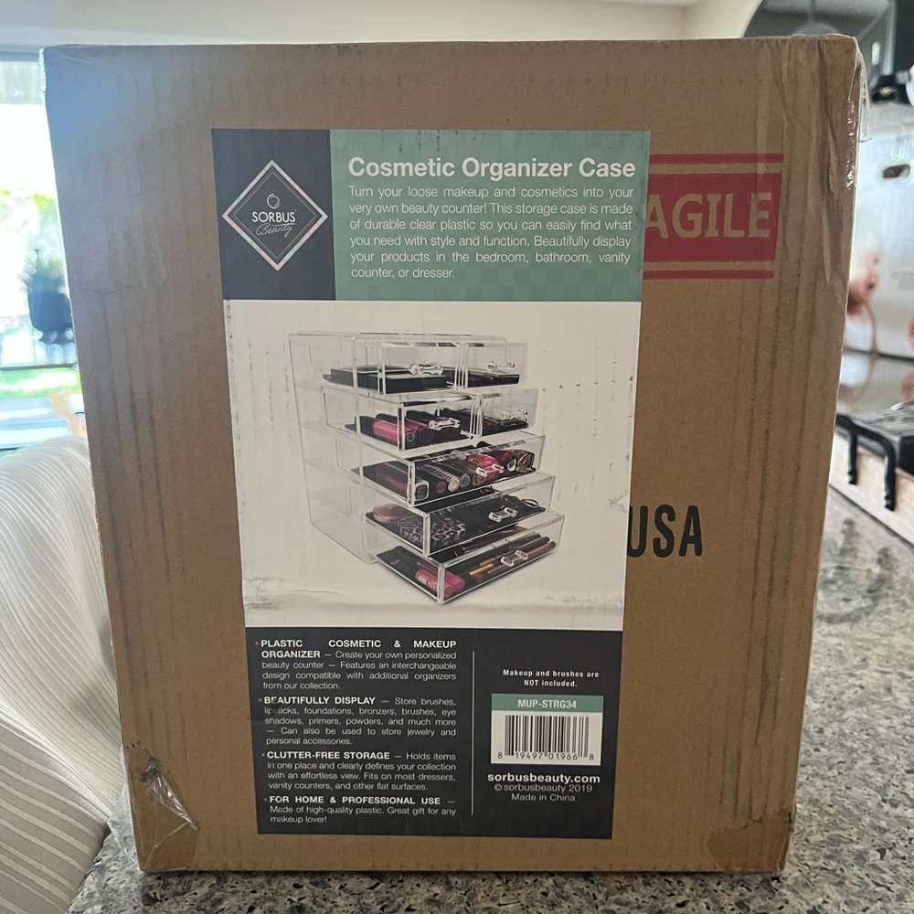 Cosmetic organizer new in box.